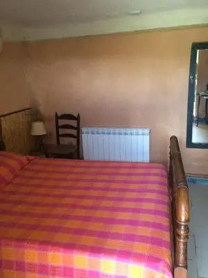 Cama o camas de una habitación en Casa Campo, Casa Rural entre Jaca y Ansó
