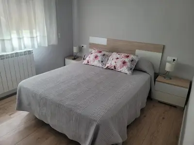 Cama o camas de una habitación en Casa Julio, bonita casa cómoda y espaciosa, totalmente reformada con terraza y jardin privado
