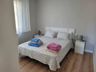 Cama o camas de una habitación en Casa Julio, bonita casa cómoda y espaciosa, totalmente reformada con terraza y jardin privado