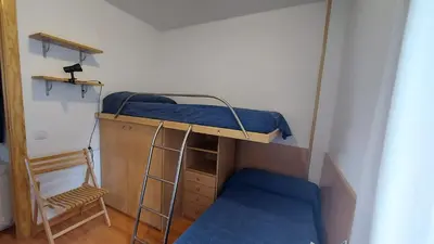Cama o camas de una habitación en CHECK IN CASAS Pirita