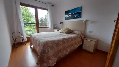Cama o camas de una habitación en CHECK IN CASAS Pirita