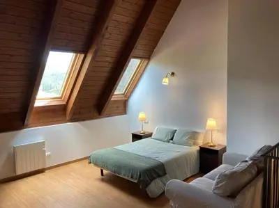 Cama o camas de una habitación en Casa rural con encanto en Hecho