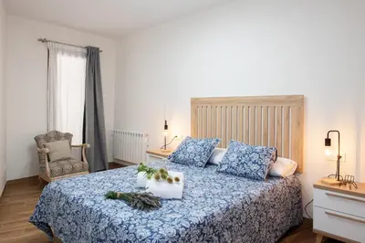 Cama o camas de una habitación en Apartamento rural Ca La Rumbeta en La Fresneda