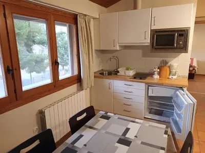 Una cocina o zona de cocina en El Sindicat de Tarrés Camins de Pedra
