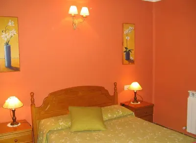 Cama o camas de una habitación en Apartamentos Casa Gallan