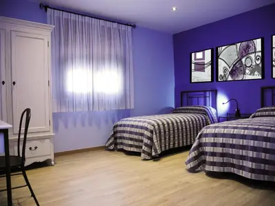Cama o camas de una habitación en El Balsetón