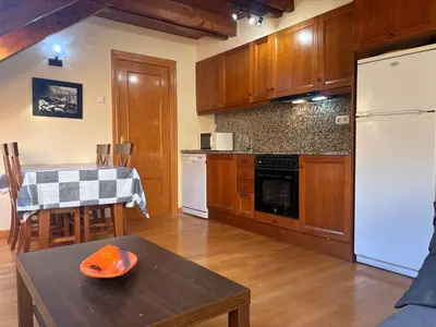 Una cocina o zona de cocina en Cocina moderna, bajo cubierta rústico- Comodidad máxima - Erta 3