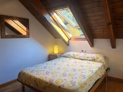 Cama o camas de una habitación en Cocina moderna, bajo cubierta rústico- Comodidad máxima - Erta 3