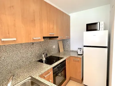 Una cocina o zona de cocina en Apartament de disseny rústic amb vistes by RURAL D'ÀNEU