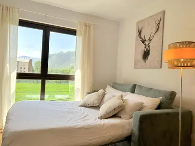 Cama o camas de una habitación en Apartament de disseny rústic amb vistes by RURAL D'ÀNEU