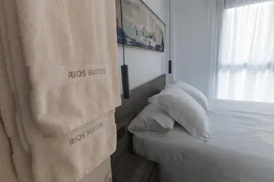 Cama o camas de una habitación en RÍOS SUITES Tudela