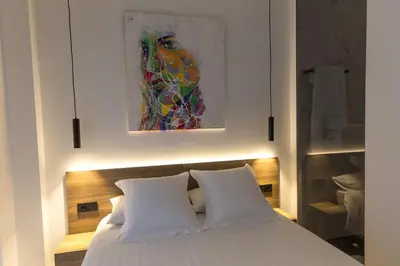 Cama o camas de una habitación en RÍOS SUITES Tudela