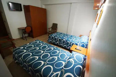 Cama o camas de una habitación en Hostal Restaurante El Surtidor