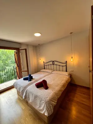 Cama o camas de una habitación en El Mirador De Cerler