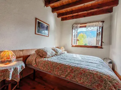 Cama o camas de una habitación en El Pirineo te espera- Chimenea, sol y ambiente acogedor con jardín - Cosmos 1