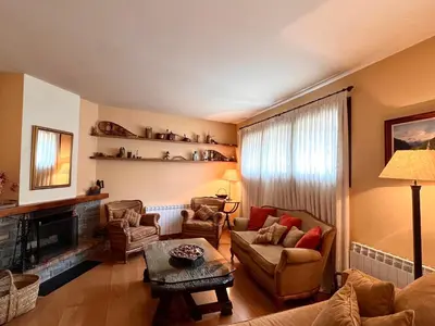 Zona de estar de Apartament de la Vall Ferrera - L'Amfitriona