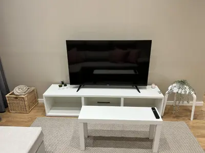 Una televisión o centro de entretenimiento en Apartamenticos Plaza Las Armas III