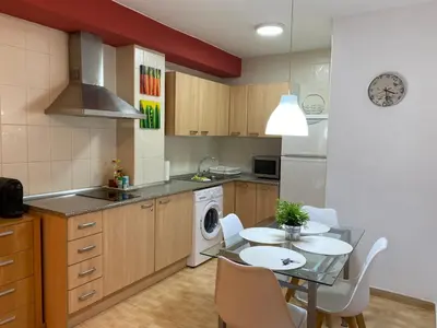 Una cocina o zona de cocina en Apartamentos Alcañiz, Santa María, 3