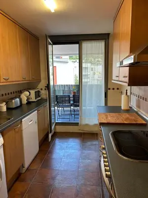 Una cocina o zona de cocina en Apartamento Cosy. Bonito y Acogedor Duplex