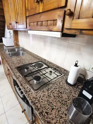 Una cocina o zona de cocina en Casa Rural con patio y BBQ en La Vall de Boí
