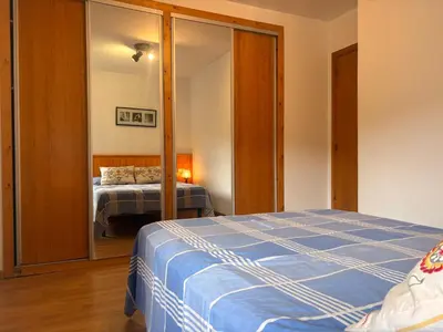 Cama o camas de una habitación en Chimenea y jardín- Calideza y espacio en la planta baja - Besiberri 11