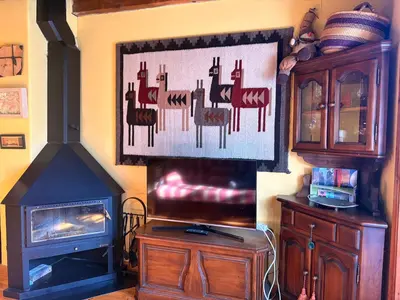 Una televisión o centro de entretenimiento en Montaña, fuego y confort- La mejor escapada - Aigüestortes 1