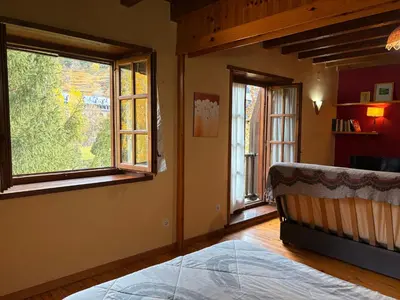 Cama o camas de una habitación en Tranquilidad en apartamento rústico con parking - Aigüestortes 3