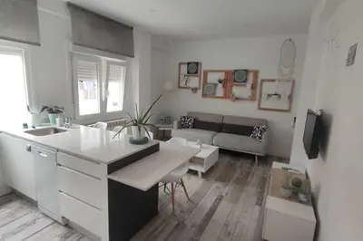 Una televisión o centro de entretenimiento en Apartamento Turquesa
