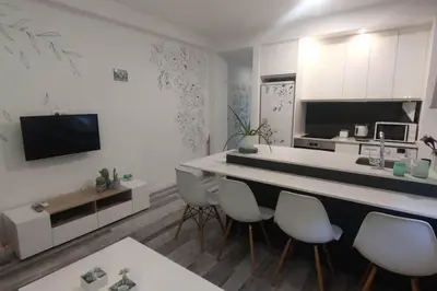Una televisión o centro de entretenimiento en Apartamento Turquesa