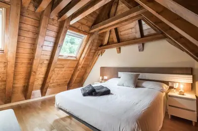 Cama o camas de una habitación en Casa Artiga de Lin by SeaMount Rentals