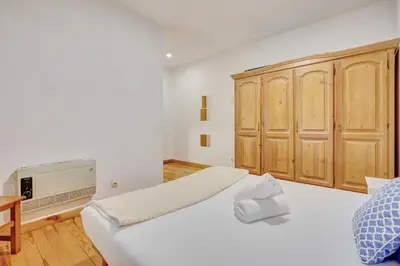 Cama o camas de una habitación en Bajada de Javier by Clabao