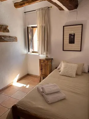 Cama o camas de una habitación en Casa Rural Cal Baté