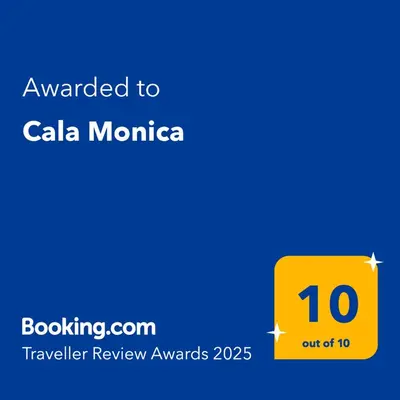 Certificado, premio, señal o documento que está expuesto en Cala Monica