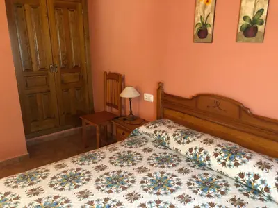 Cama o camas de una habitación en apartamentos casa botero