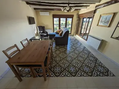 Zona de estar de Apartamentos Rurales CR Mazaleón