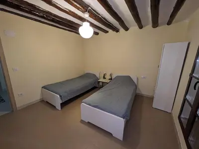 Cama o camas de una habitación en Apartamentos Rurales CR Mazaleón