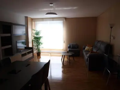 Una televisión o centro de entretenimiento en Apartamento Sadar