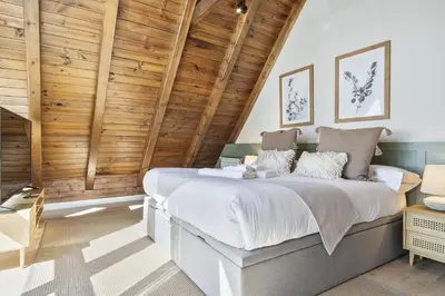 Cama o camas de una habitación en Luderna - Dúplex Aiguamog