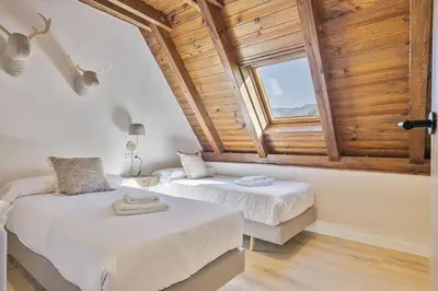 Cama o camas de una habitación en Luderna - Dúplex Aiguamog
