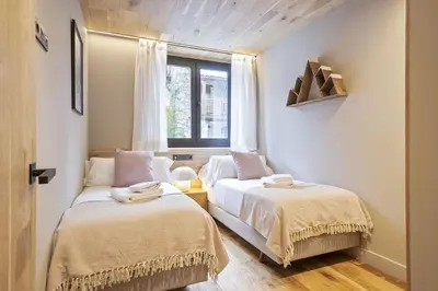 Cama o camas de una habitación en Luderna - Apartamento con jardín Marconi