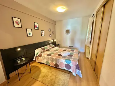 Cama o camas de una habitación en Apartamentos Confort Formigal 3000