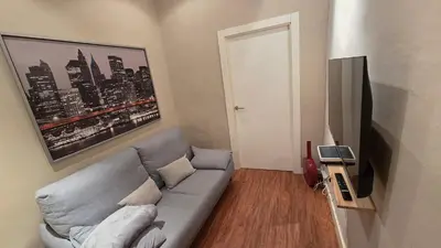 Una televisión o centro de entretenimiento en Apartamento Curia 6 by Clabao