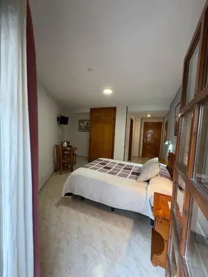Cama o camas de una habitación en Hostal Marboré