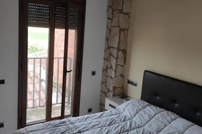 Cama o camas de una habitación en Ca Serrulleta