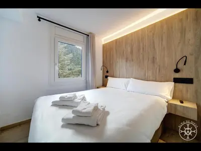 Cama o camas de una habitación en SHIVAU de Alma de Nieve