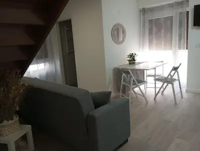 Zona de estar de Apartamentos 