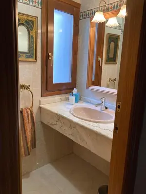 Un baño de Las Mañanitas