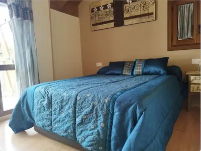 Cama o camas de una habitación en CHECK-IN CASAS El Ru