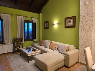 Zona de estar de Un encanto de dúplex