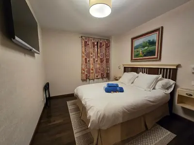 Cama o camas de una habitación en Un encanto de dúplex